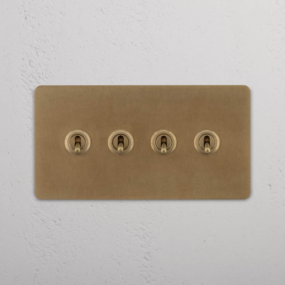 Corston-Kipphebelschalter 4x in Zweifachrahmen – Antikes Messing
