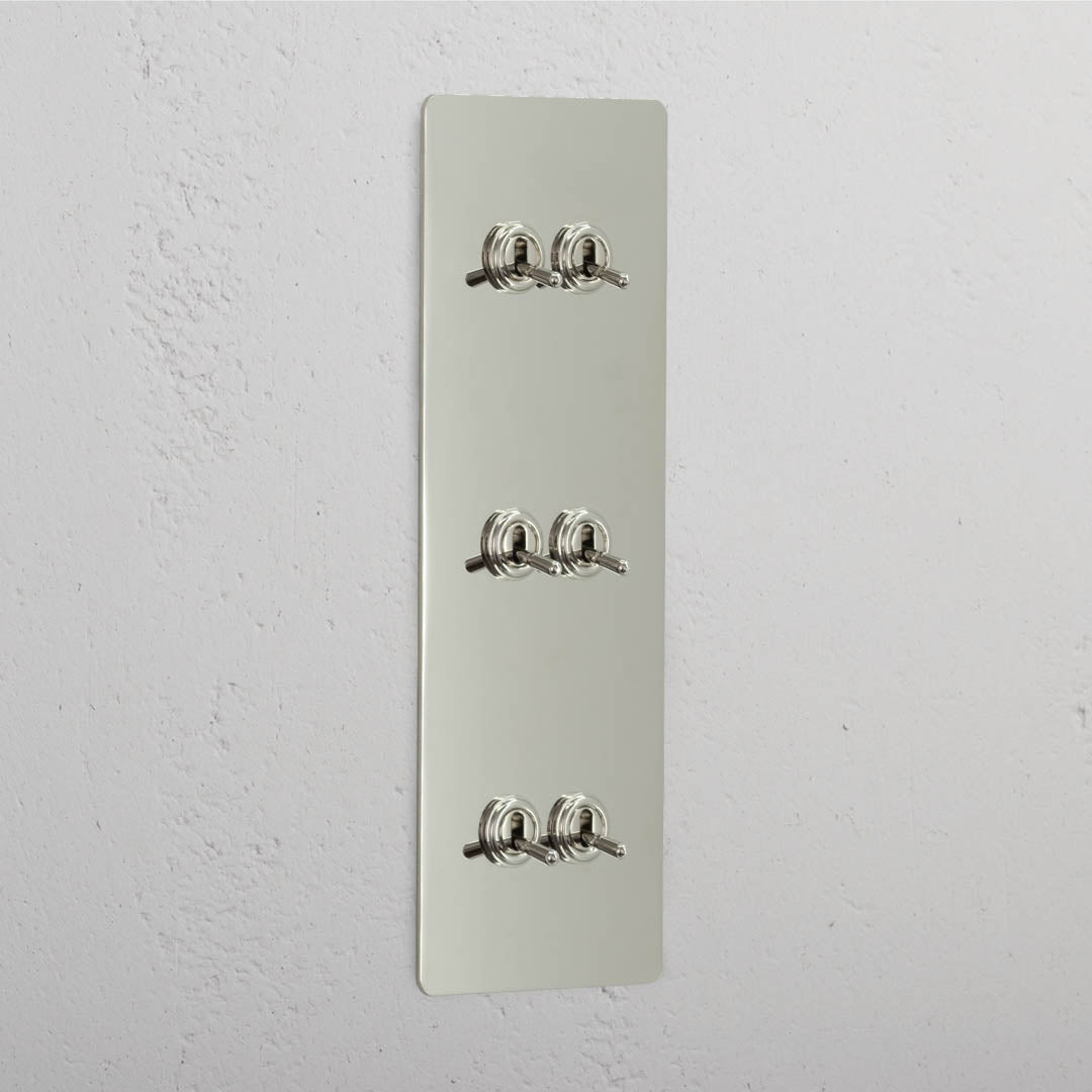 Corston-Kipphebelschalter 6x in vertikalem Dreifachrahmen – Poliertes Nickel