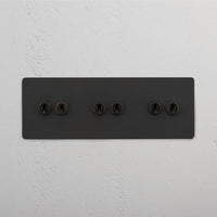 Corston-Kipphebelschalter 6x in Dreifachrahmen – Bronze