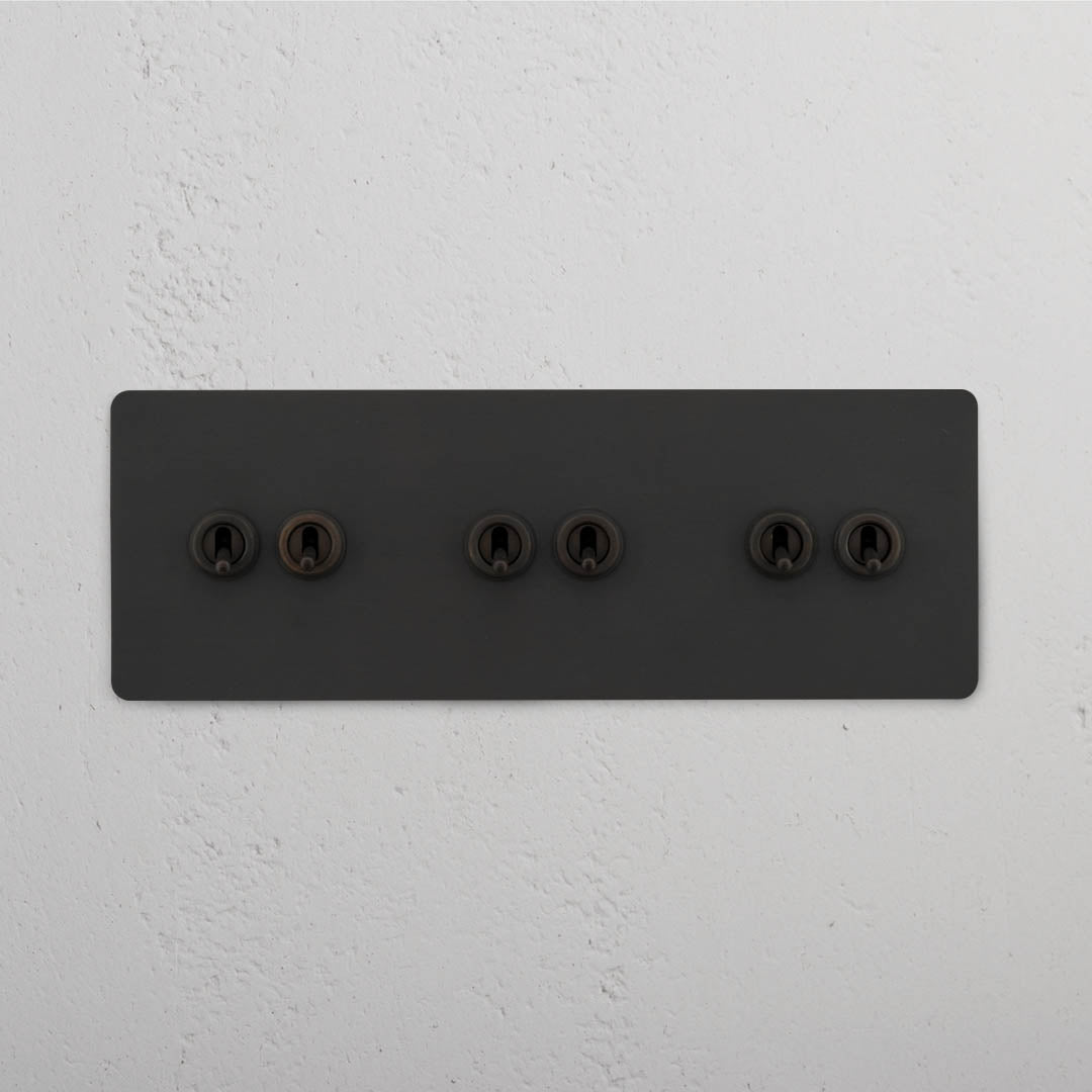 Corston-Kipphebelschalter 6x in Dreifachrahmen – Bronze