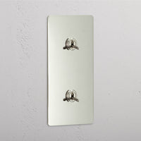 Corston-Kipphebelschalter 2x in vertikalem Zweifachrahmen – Poliertes Nickel