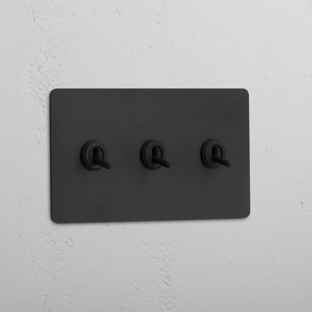 Corston-Kipphebelschalter 3x in Zweifachrahmen – Bronze