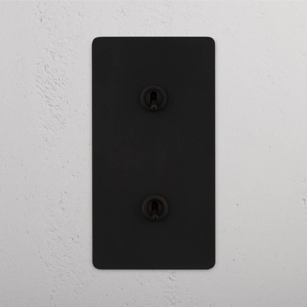 Corston-Kipphebelschalter 2x in vertikalem Zweifachrahmen – Bronze