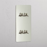 Corston-Kipphebelschalter 4x in vertikalem Zweifachrahmen – Poliertes Nickel