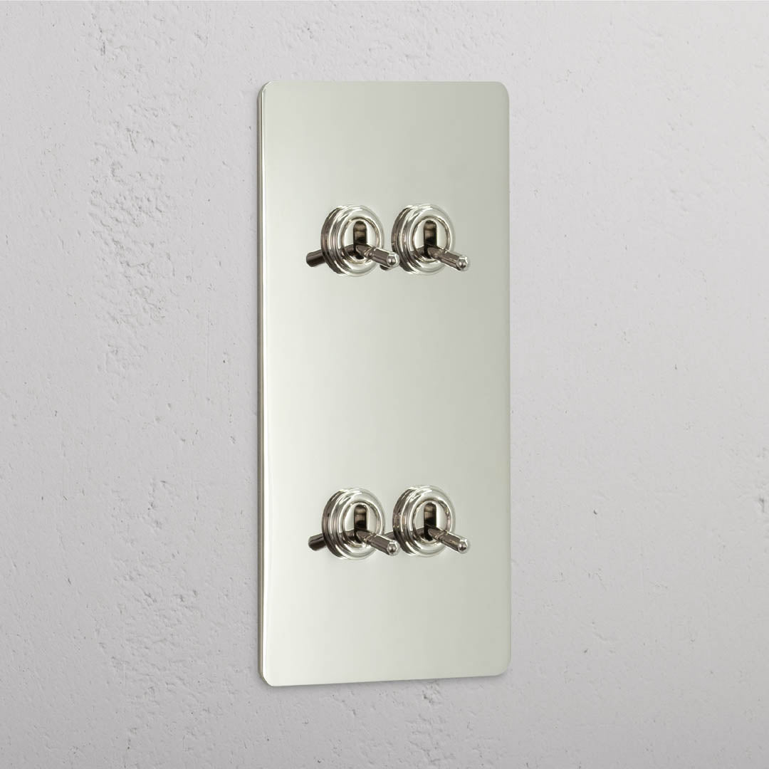 Corston-Kipphebelschalter 4x in vertikalem Zweifachrahmen – Poliertes Nickel