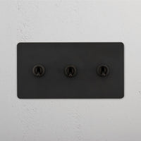 Corston-Kipphebelschalter 3x in Zweifachrahmen – Bronze