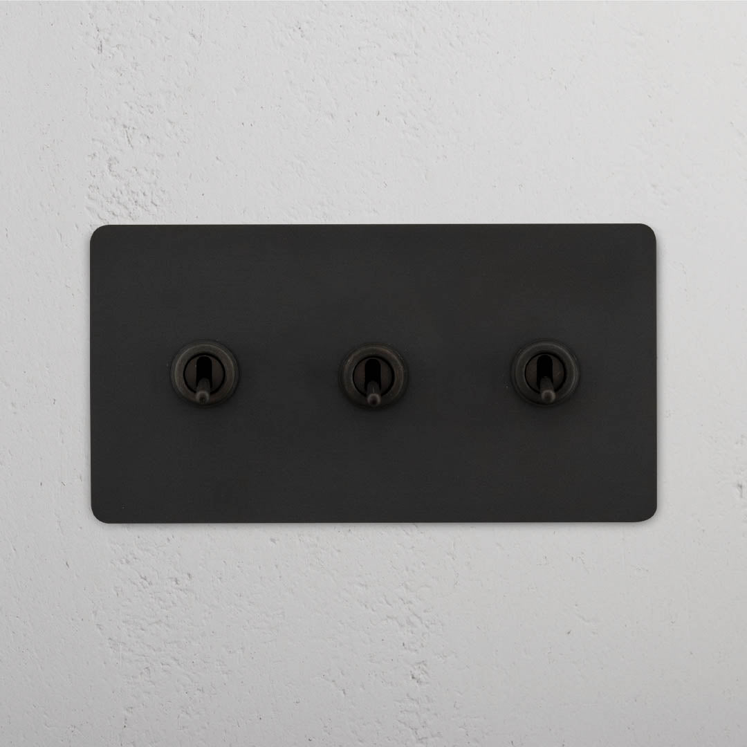 Corston-Kipphebelschalter 3x in Zweifachrahmen – Bronze