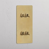 Corston-Kipphebelschalter 4x in vertikalem Zweifachrahmen – Antikes Messing