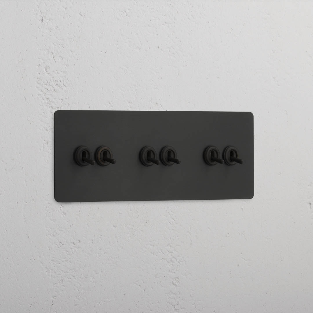 Corston-Kipphebelschalter 6x in Dreifachrahmen – Bronze