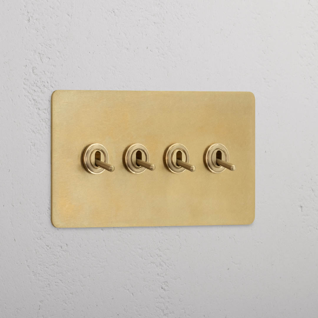 Corston-Kipphebelschalter 4x in Zweifachrahmen – Antikes Messing