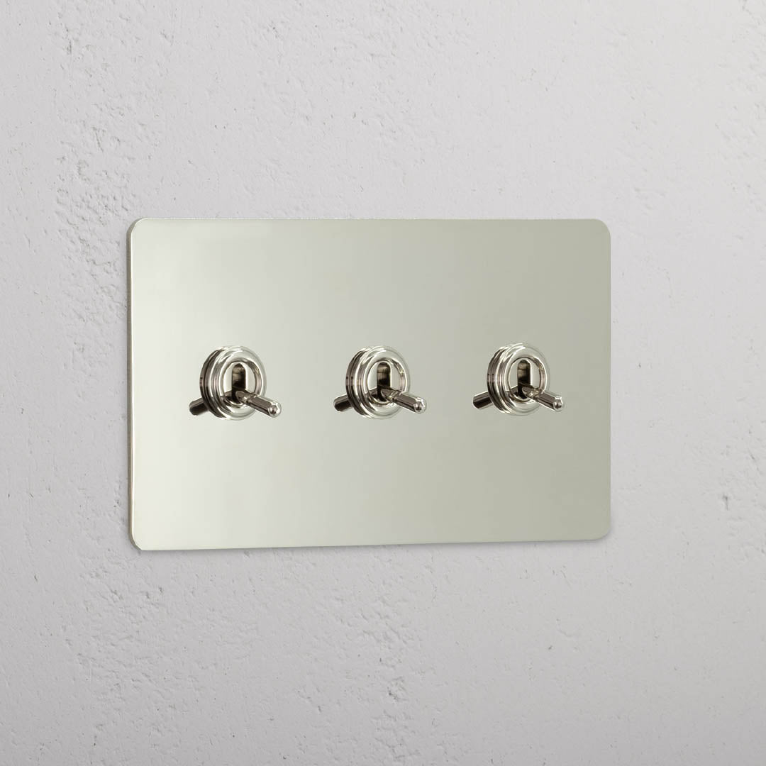 Corston-Kipphebelschalter 3x in Zweifachrahmen – Poliertes Nickel