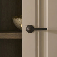 Corston Harper gefederter Türgriff – Bronze