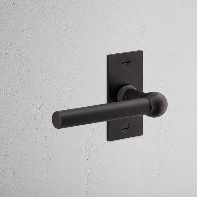 Corston Harper gefederter Türgriff mit Kurzschild – Bronze