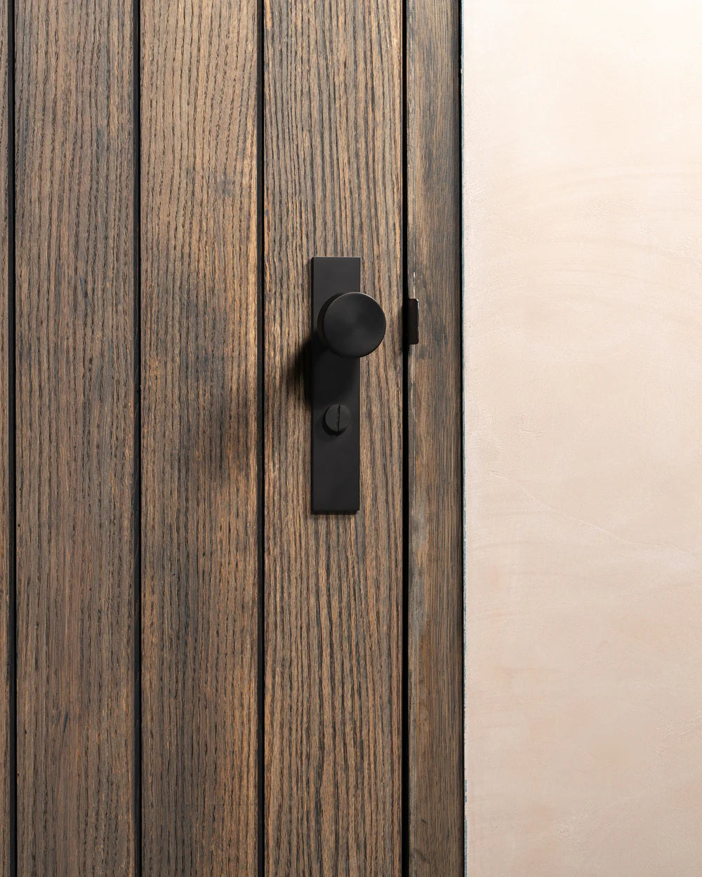 Corston Onslow Langschildgarnitur mit gefedertem Türknauf und Drehknopf – Bronze