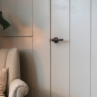 Corston Harper gefederter Türgriff – Bronze