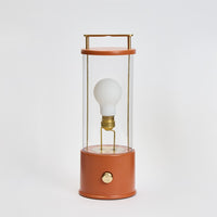 Muse – Tragbare Designerlampe in Claycourt Orange mit Dim-to-Warm & IP44