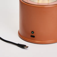 Muse – Tragbare Designerlampe in Claycourt Orange mit Dim-to-Warm & IP44