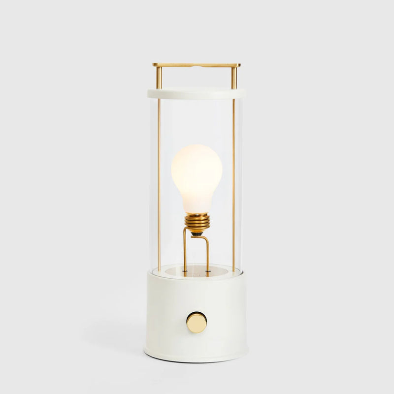 Die tragbare Lampe „Muse“ in Candlenut-Weiß