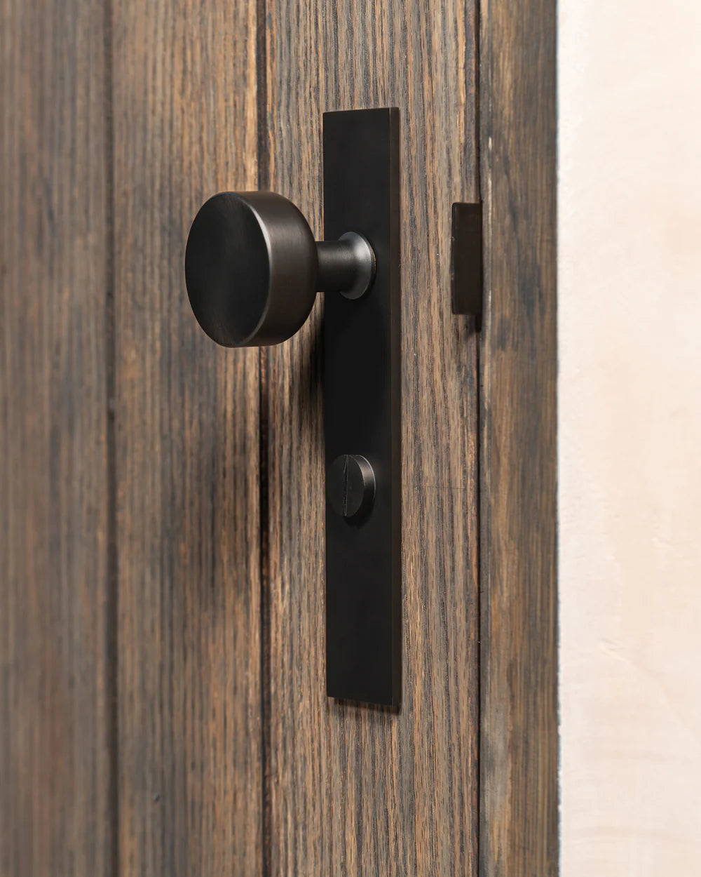 Corston Onslow Langschildgarnitur mit gefedertem Türknauf und Drehknopf – Bronze