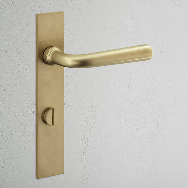 Corston Apsley Langschildgarnitur mit gefedertem Türgriff und Drehknopf – Antikes Messing