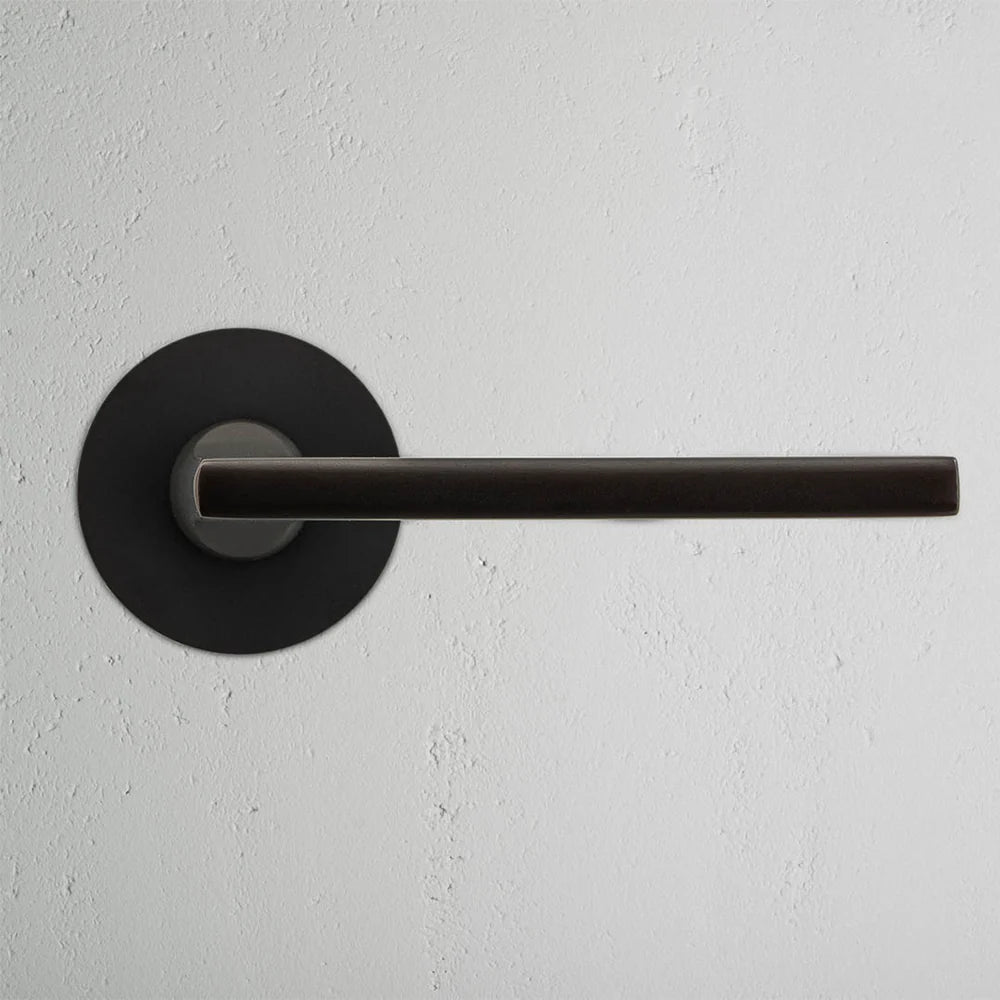 Corston Clayton gefederter Türgriff mit Niedrigprofilrosette – Bronze