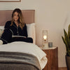 Die tragbare Lampe „Muse“ in Candlenut-Weiß